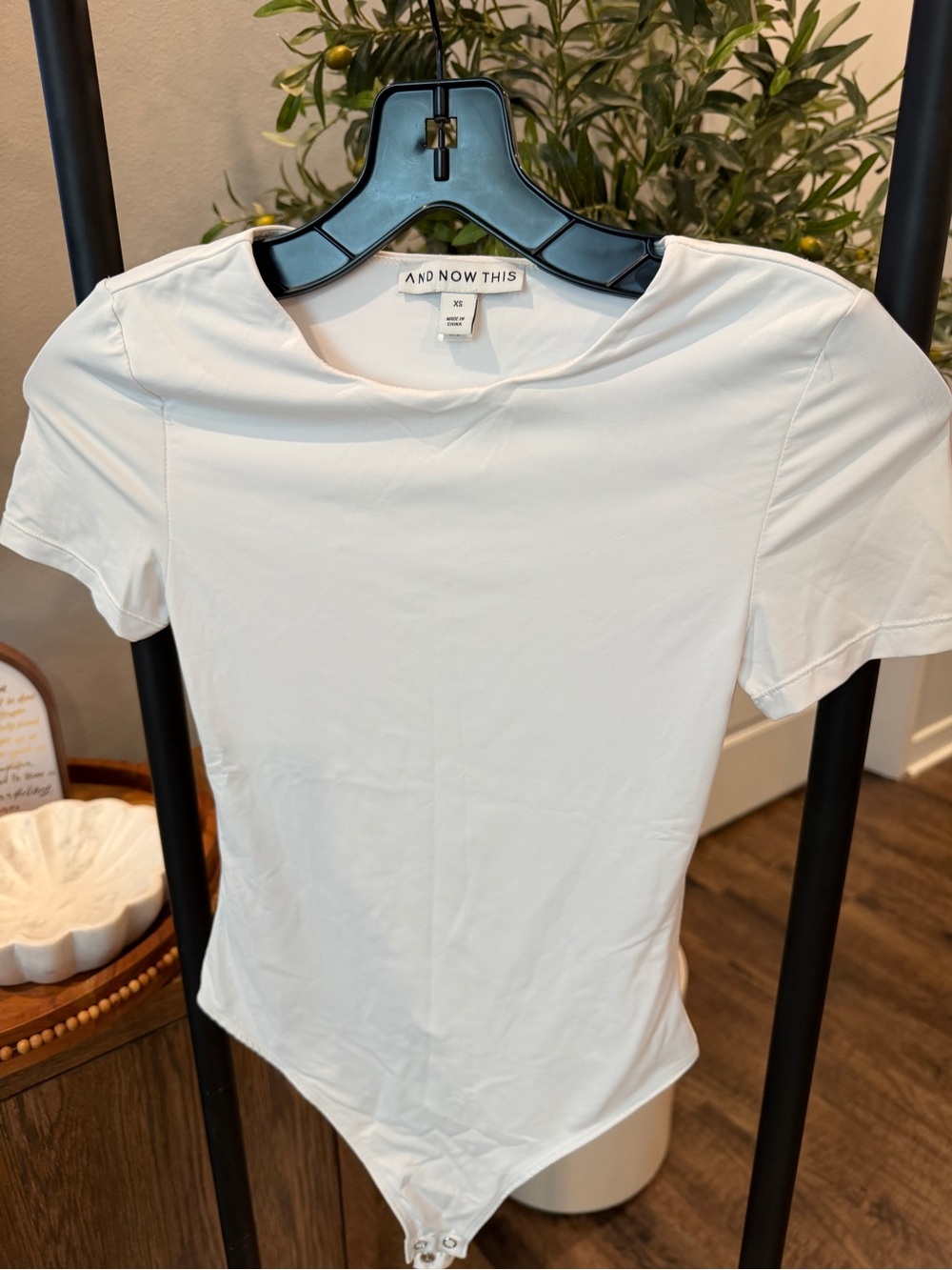 And Now This White Short-Sleeve Crewneck Bodysuit